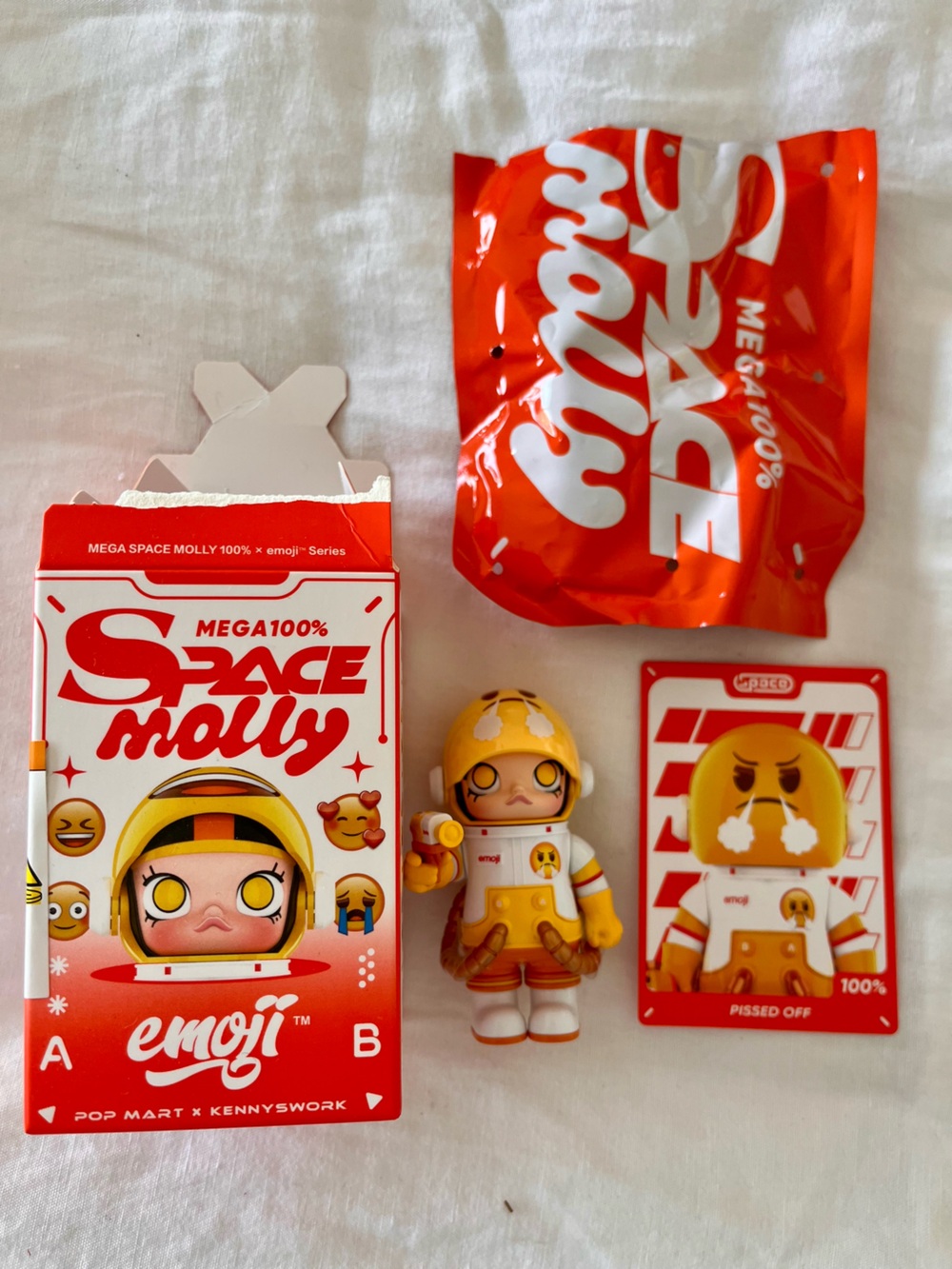 Space Molly Emoji Yellow Vinyl Figure by Pop Mart